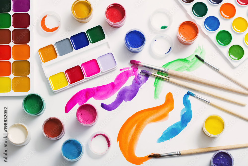 paints and brushes on paper paints and brushes on paper