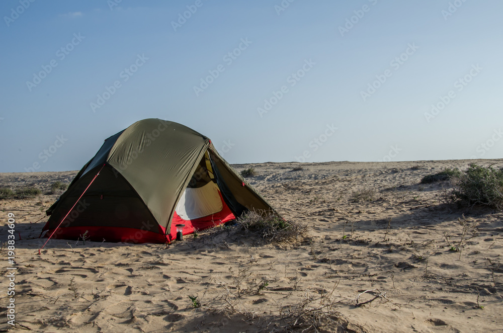 Wild camping on sandy beach in Oman