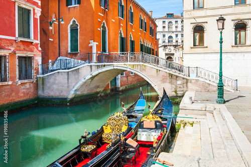 Scenic canal with godolas in Venice, Italy.