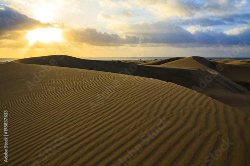 Rippled and smooth sand of dunes of Maspalomas in Gran Canaria.