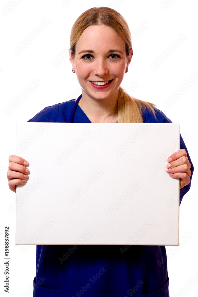 Junge Krankenschwester mit Schild Junge Krankenschwester mit Schild