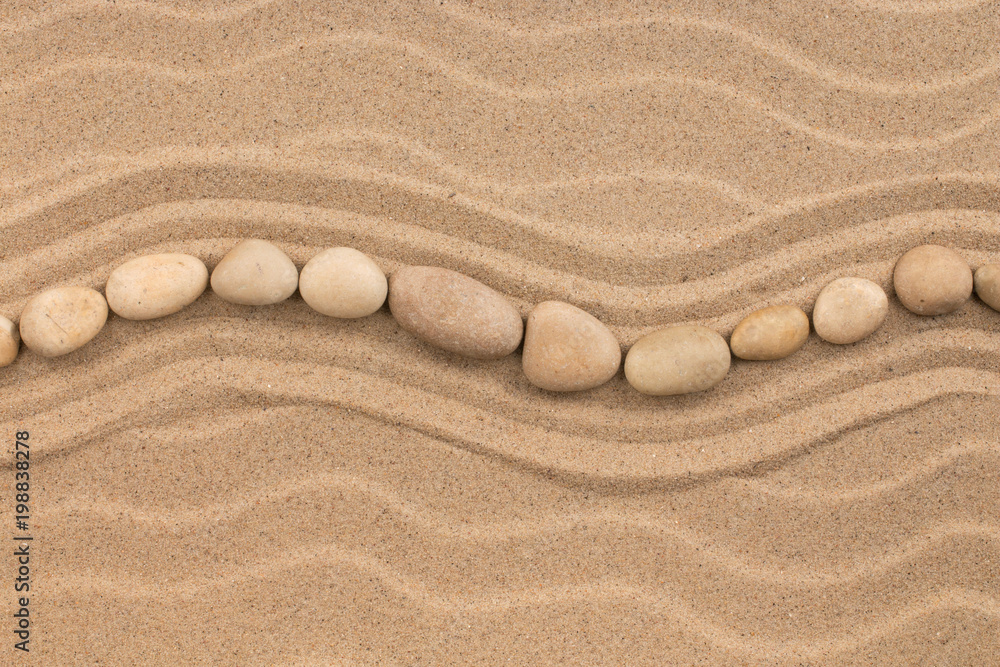 Line made of white stones lying wavy, on sand dune. Line made of white stones lying wavy, on sand dune.