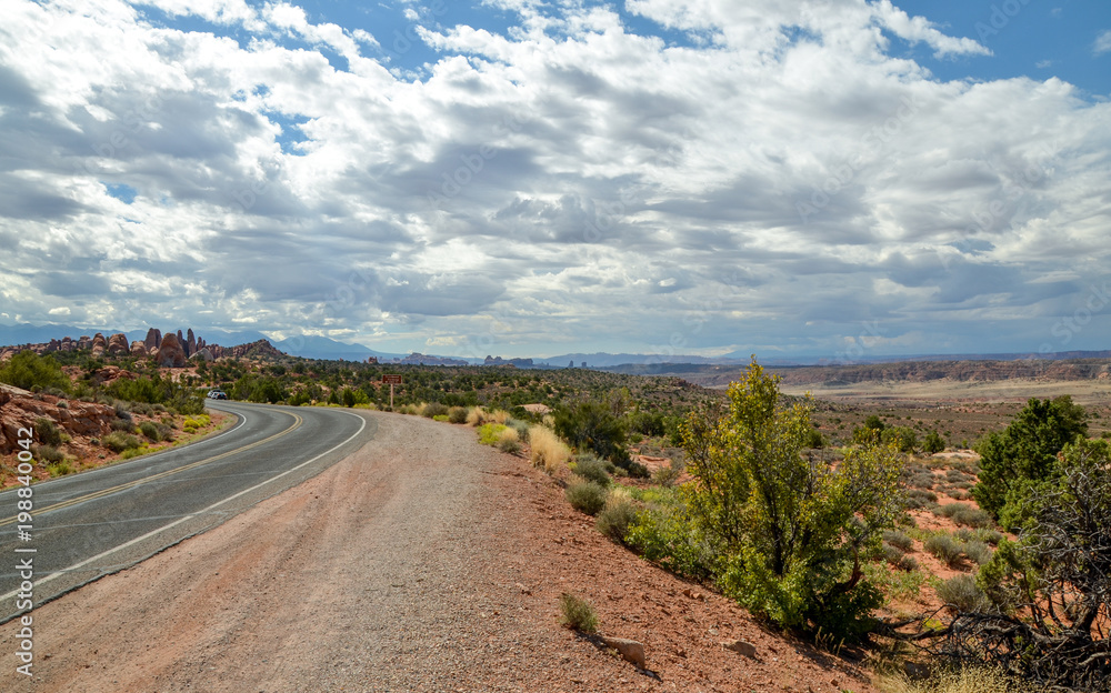Salt Valley and surrounding mountains panorama from Devils Garden road  Arches National Park, Moab, Utah