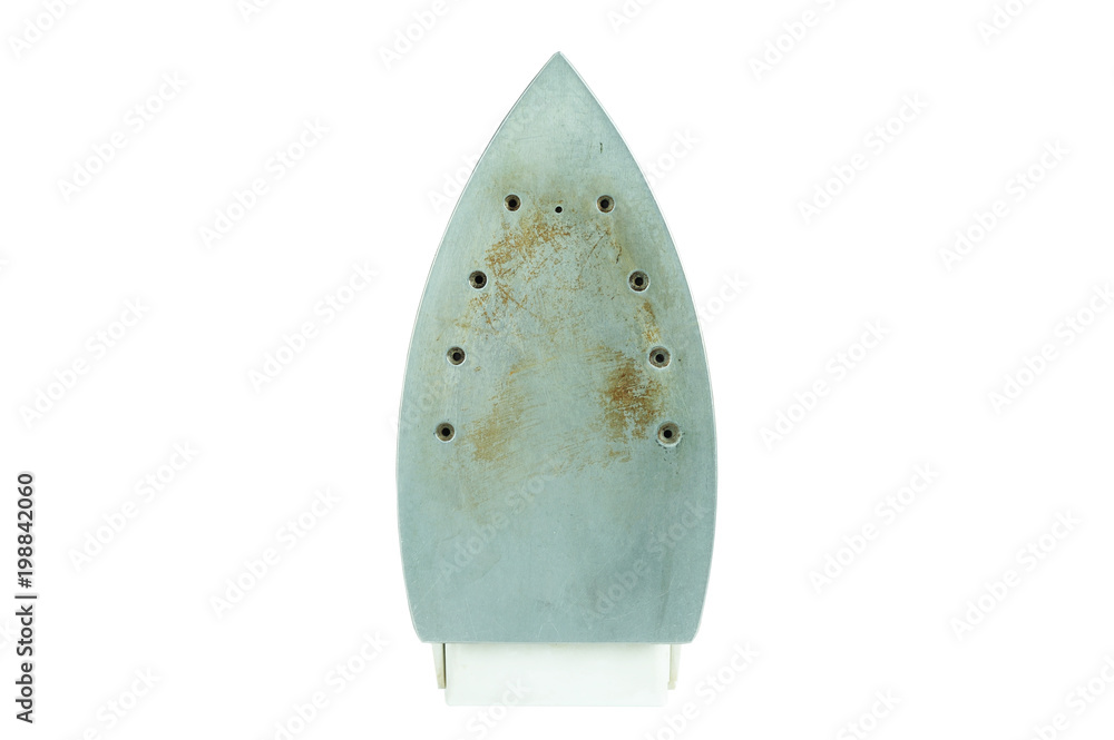 The sole of the iron, isolated on white background The sole of the iron, isolated on white background