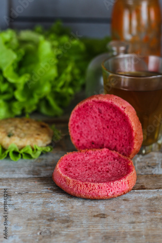 burgers pink (sandwiches) dough with beetroot juice. Beetroot buns burgers