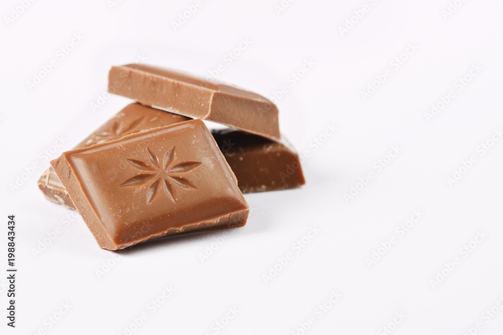 Close up a chocolate bar isolated on white background. Close up a chocolate bar isolated on white background.