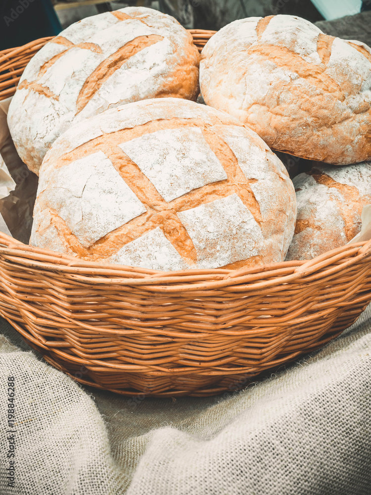 Fresh hearth round bread in basket