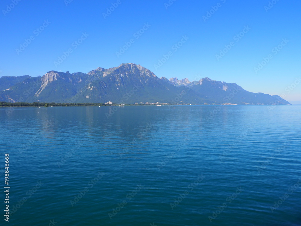 Obraz premium Panoramic alpine Lake Geneva landscape seen from Chateau de Chillon in Montreux city in SWITZERLAND