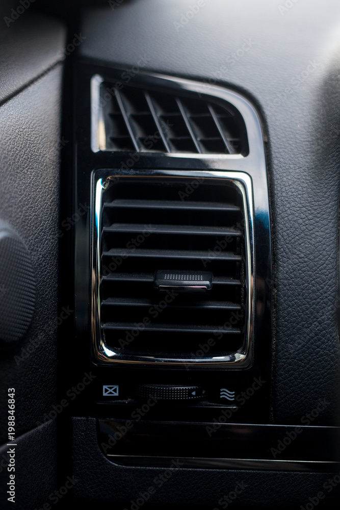 Car conditioner. The air flow inside the car. Detail interior