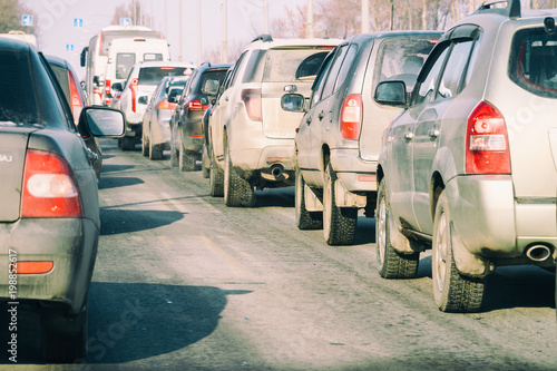 Valokuva Cars standing in a traffic jam on city street