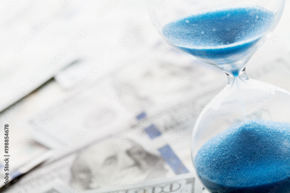 Banking, payment and debt concept. Dollar money and hourglass. Banking, payment and debt concept. Dollar money and hourglass.