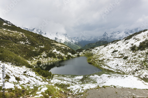 Zeinis Lake With Snow In Summer In Galtuer, Austria