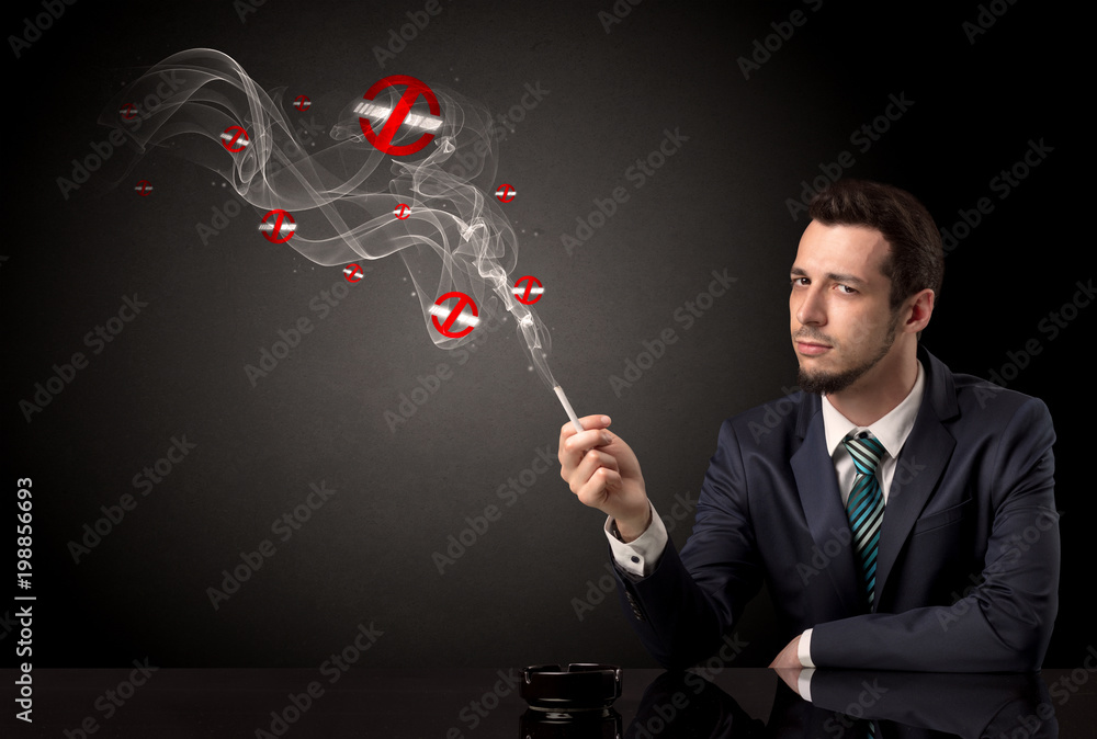 Businessman smoking with colored no smoking symbols nearby. Businessman smoking with colored no smoking symbols nearby.