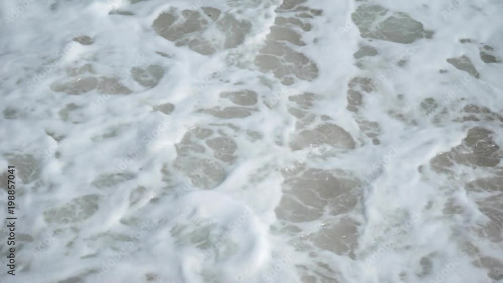 Soft wave of the sea on the sandy beach Soft wave of the sea on the sandy beach