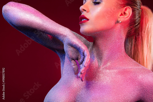Portrait of nude girl body painted with tinsel and sparkles on black  background Stock Photo | Adobe Stock