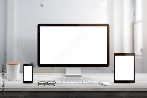 Isolated computer, tablet and smart phone display scene for responsive design promotion. photo