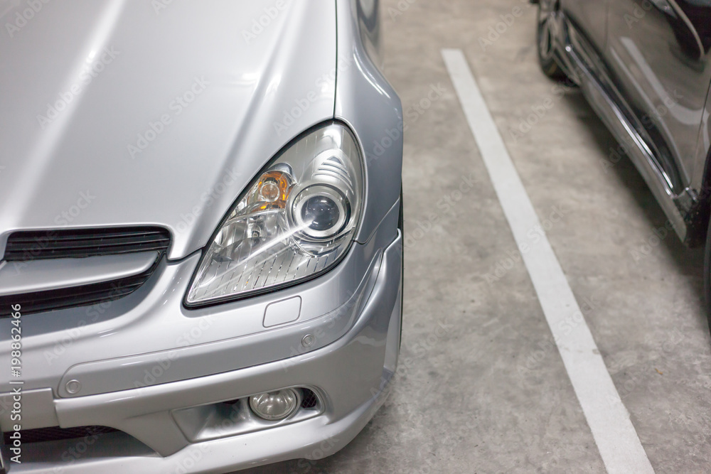 Car headlights. Exterior detail background.