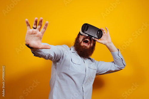 Shocked man in virtual reality