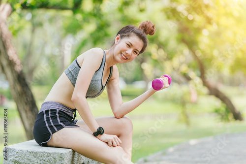 Asian cute teen slim and healthy happy to workout in park