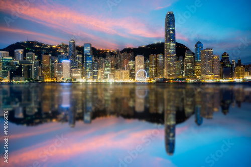 Hong Kong City skyline at sunrise. View from across Victoria Harbor Hongkong.