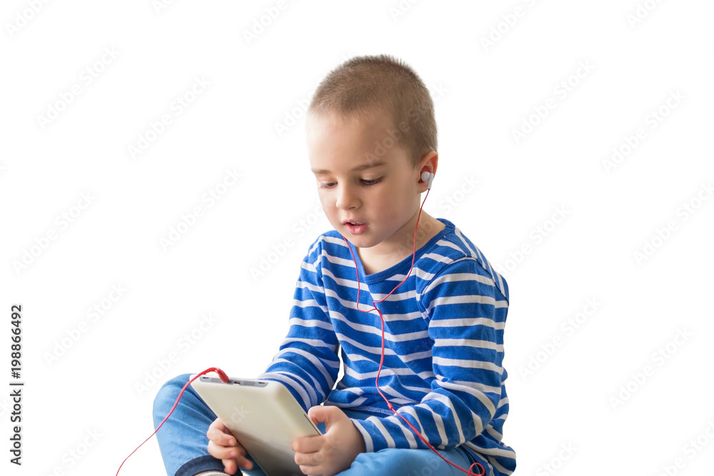 Cute boy in headphones watching video isolated on white background Cute boy in headphones watching video isolated on white background