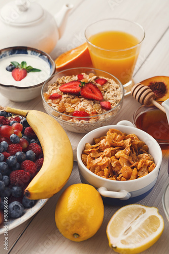 Fresh healthy breakfast with fruits closeup