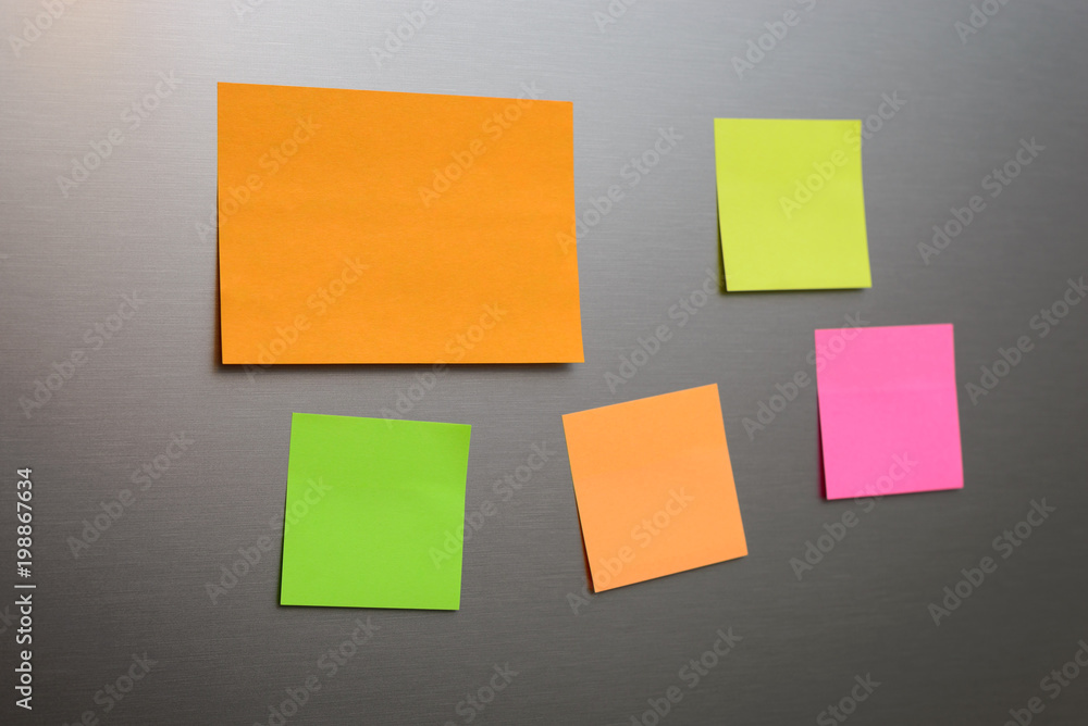 Message paper pasted on metal surface. It can represent the messages left by members of a family. Message paper pasted on metal surface. It can represent the messages left by members of a family.