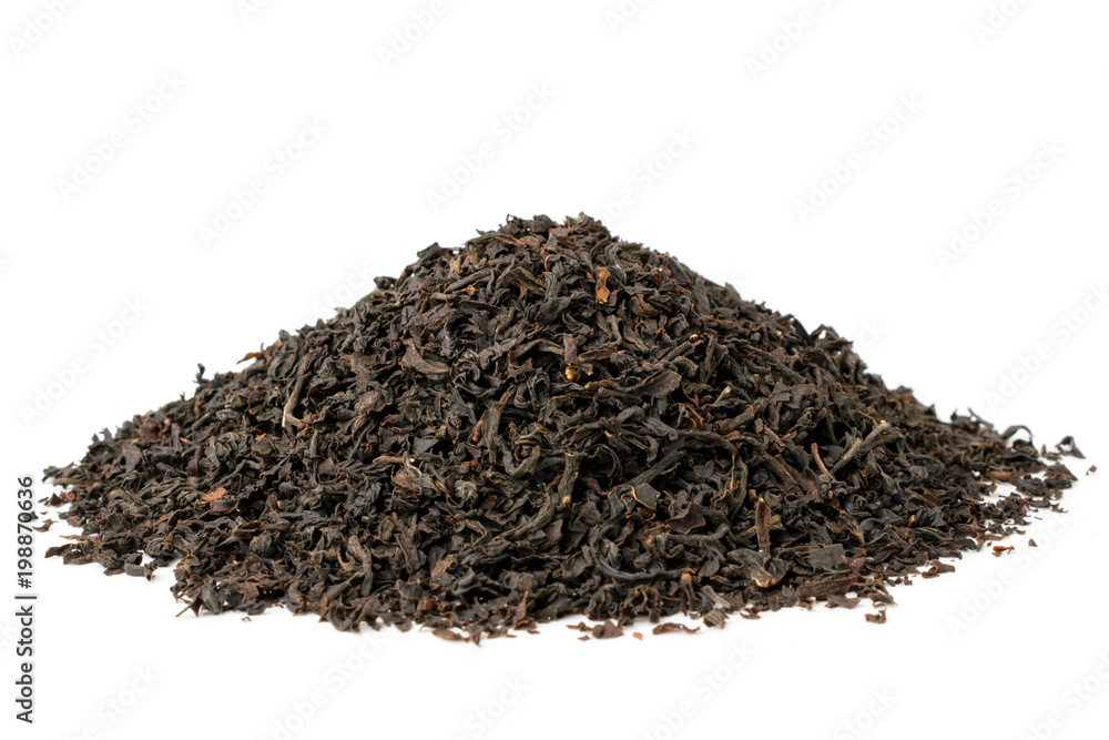 Bunch of dry black tea leaves on a white, close up. Bunch of dry black tea leaves on a white, close up.