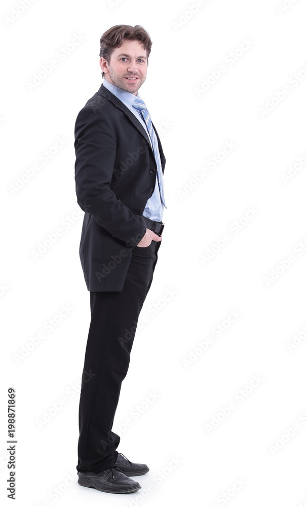 in full growth. side view.smiling handsome businessman in full growth. side view.smiling handsome businessman
