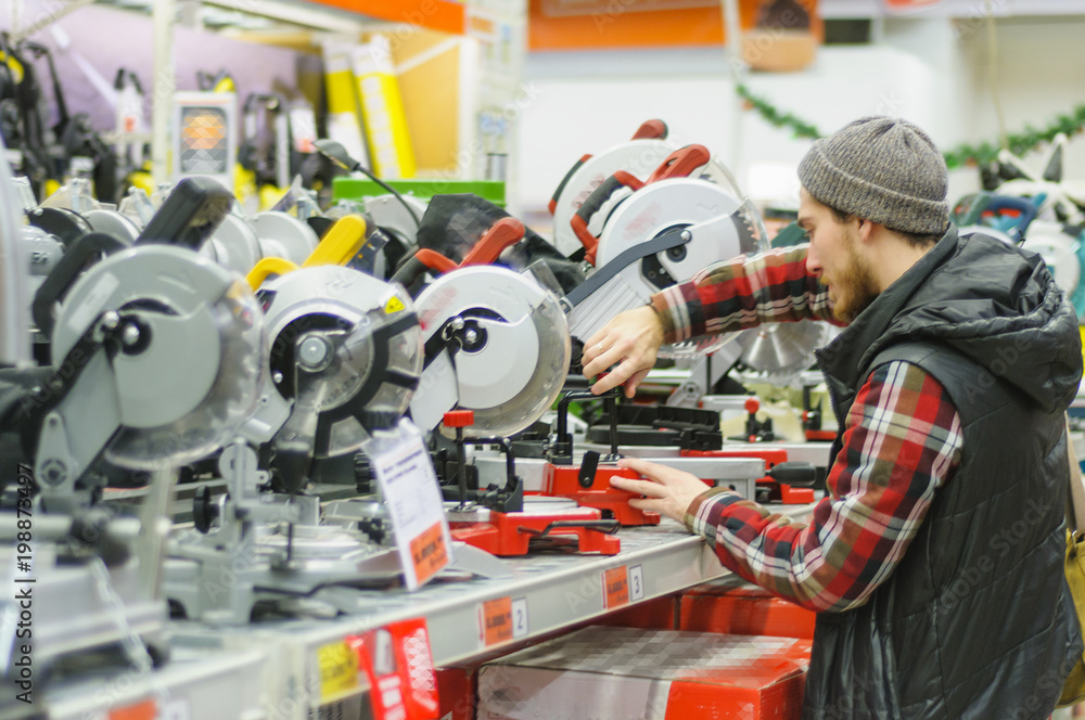Man in a hardware store Man in a hardware store