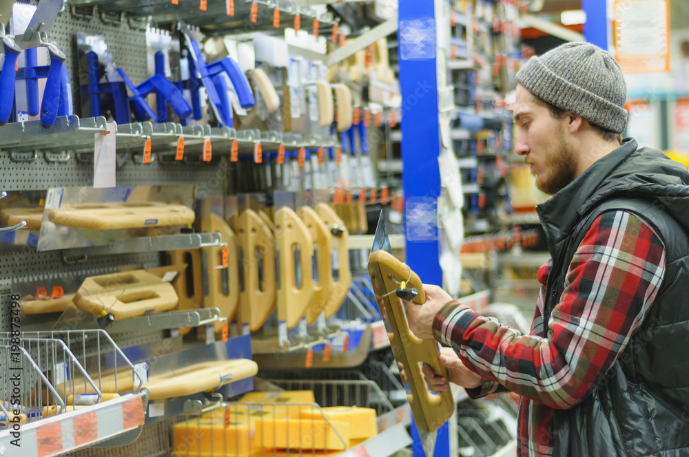 Fototapeta premium Man in a hardware store