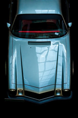 Poster Zwart Vintage oldtimer op zwarte achtergrond  © Mikhail