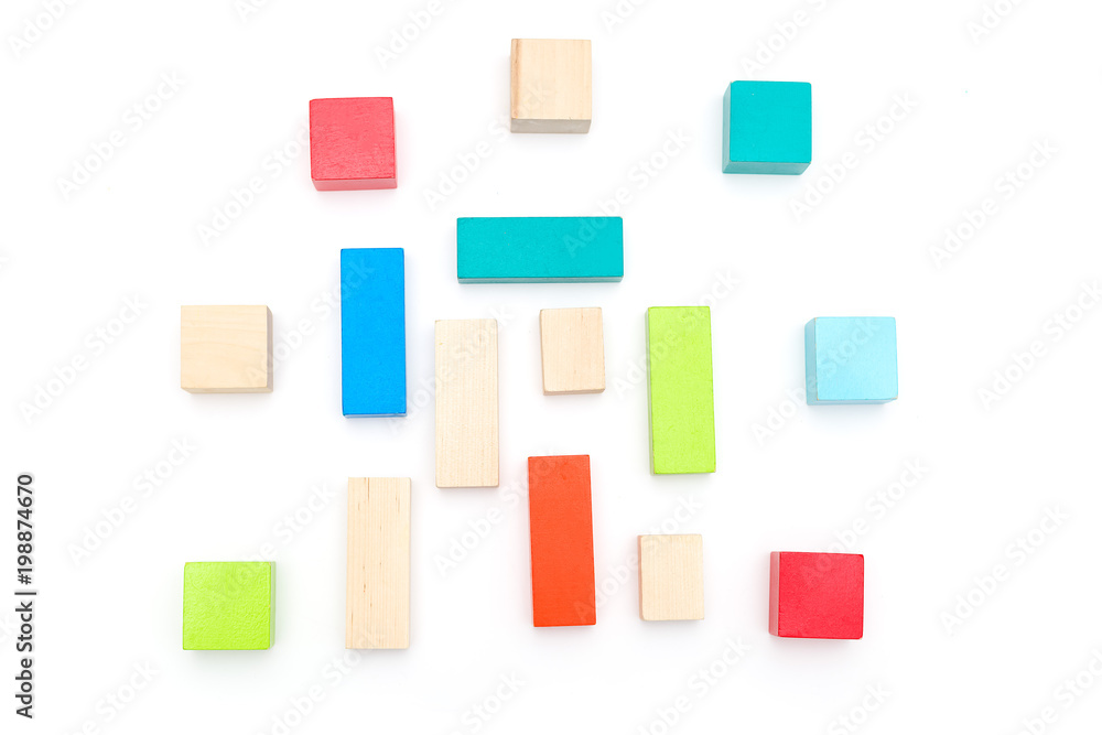 Multicolored wooden cubes on a white background. Education concep Multicolored wooden cubes on a white background. Education concep