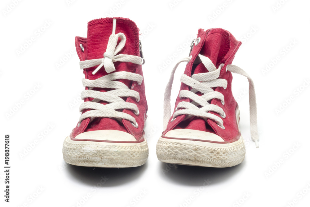 Red sneakers isolated on a white background Red sneakers isolated on a white background