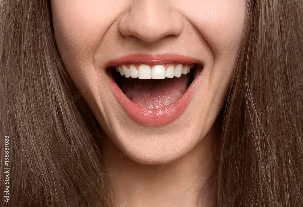 Young woman with beautiful smile, closeup. Teeth whitening Young woman with beautiful smile, closeup. Teeth whitening