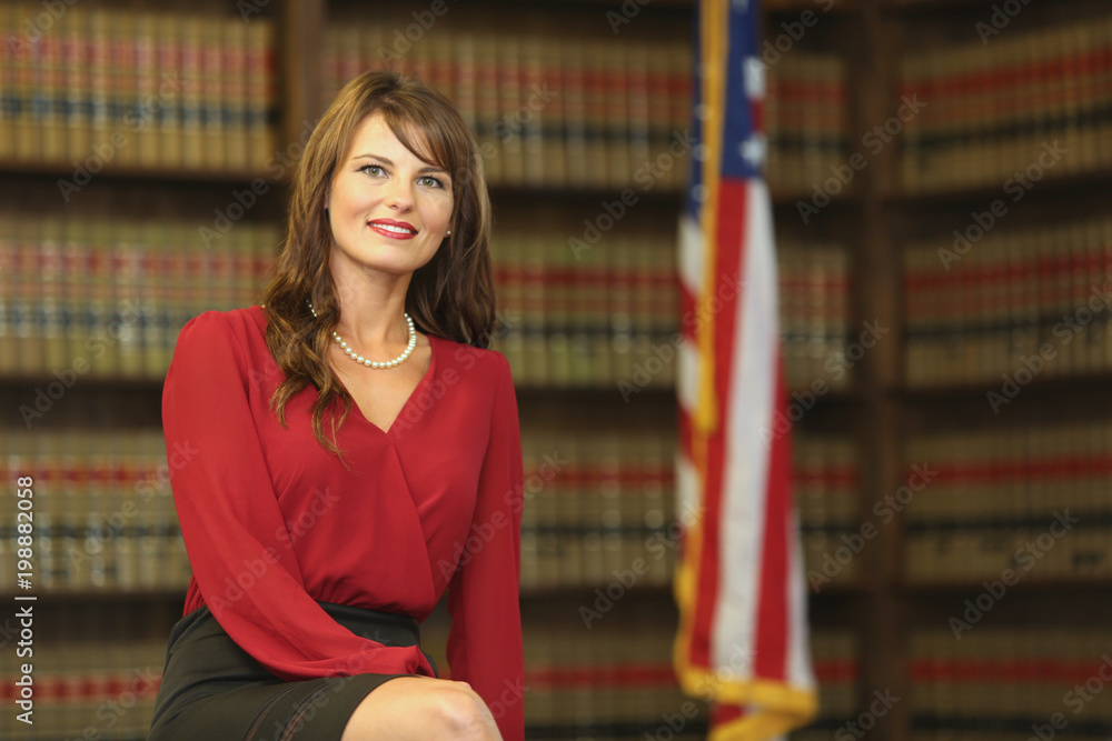 Young attractive professional woman, female attorney in law office Young attractive professional woman, female attorney in law office