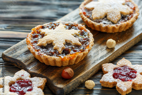 Cakes with dried fruits, orange jam and nuts. photo