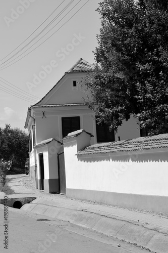 Typical rural landscape in Veseud, Zied, a village in the commune Chirpăr from Sibiu County, Transylvania, Romania, first attested in 1379. Peasant houses photo