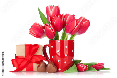 Red tulip flowers bouquet and gift box
