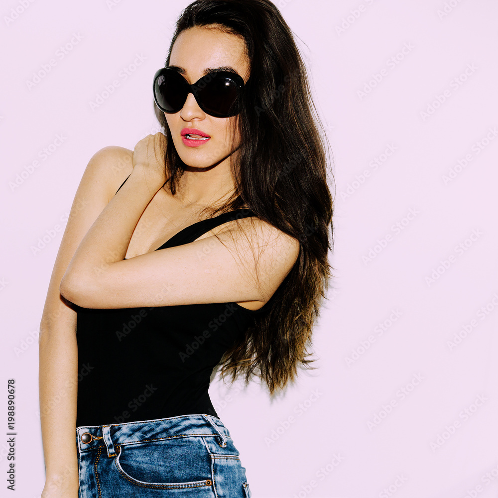 Brunette Girl in black body and trendy sunglasses. Summer look Brunette Girl in black body and trendy sunglasses. Summer look