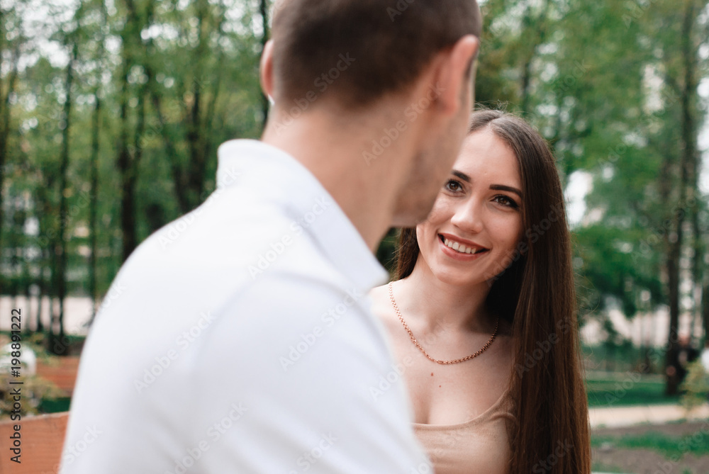 Young beautiful couple walking outdoor Young beautiful couple walking outdoor