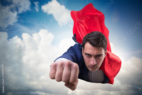 Flying super hero over the city 