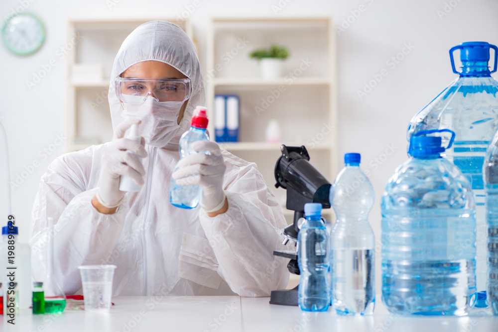 Lab assistant testing water quality Lab assistant testing water quality