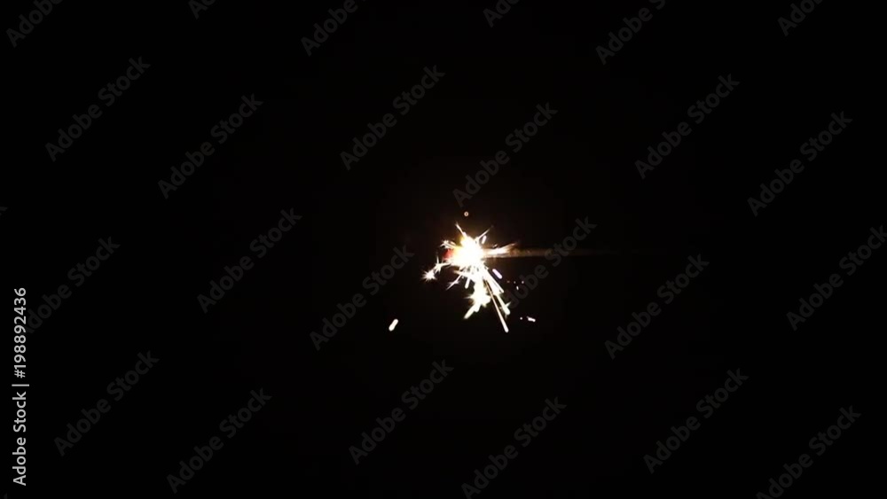 Sparkler Over Black . Gun powder sparks shot against deep dark ...