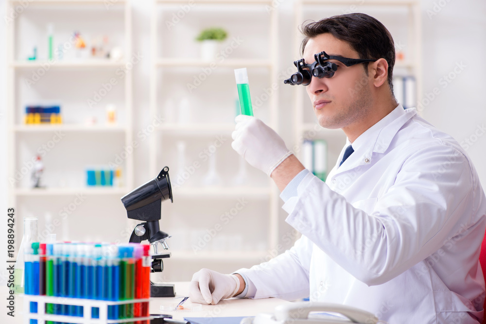 Chemist working on cannabis extract for medical purposes Chemist working on cannabis extract for medical purposes