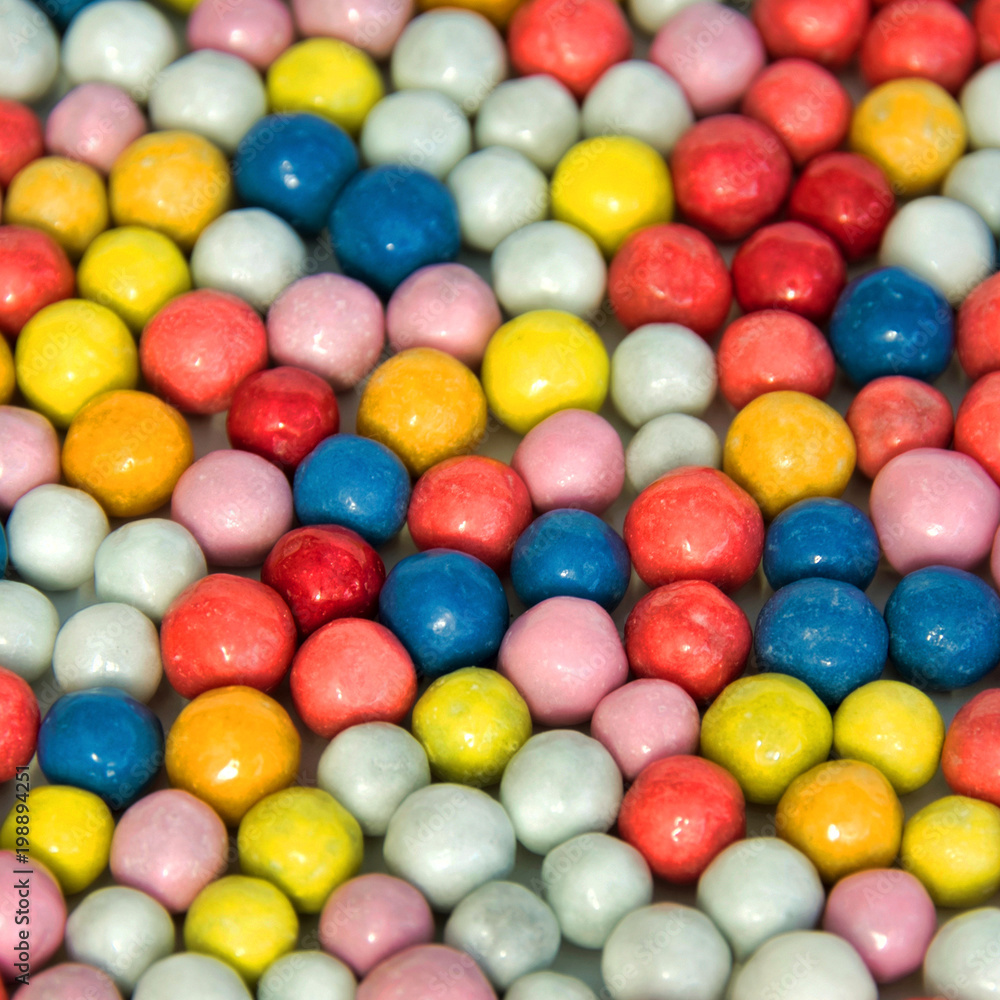 Background of small round multi-colored sweets. Background of small round multi-colored sweets.