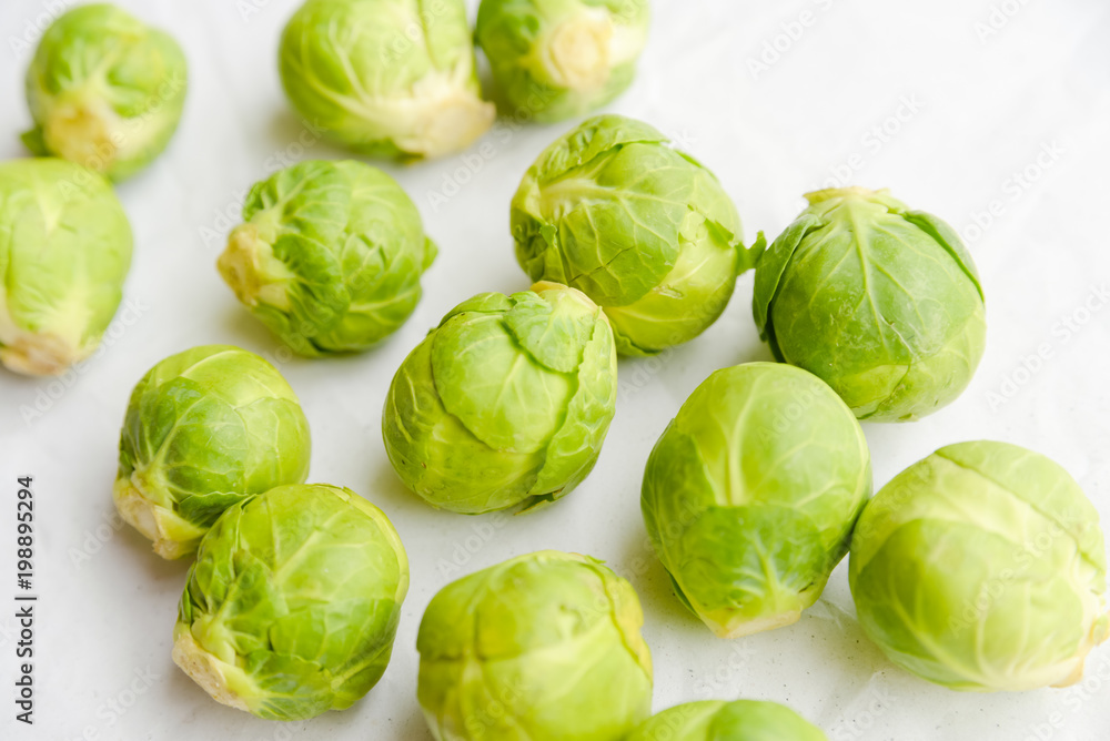 Fototapeta premium a pile of Brussels sprouts on a white background
