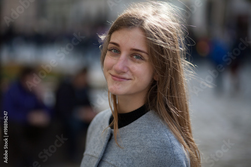 Portrait young businesswomen in gray