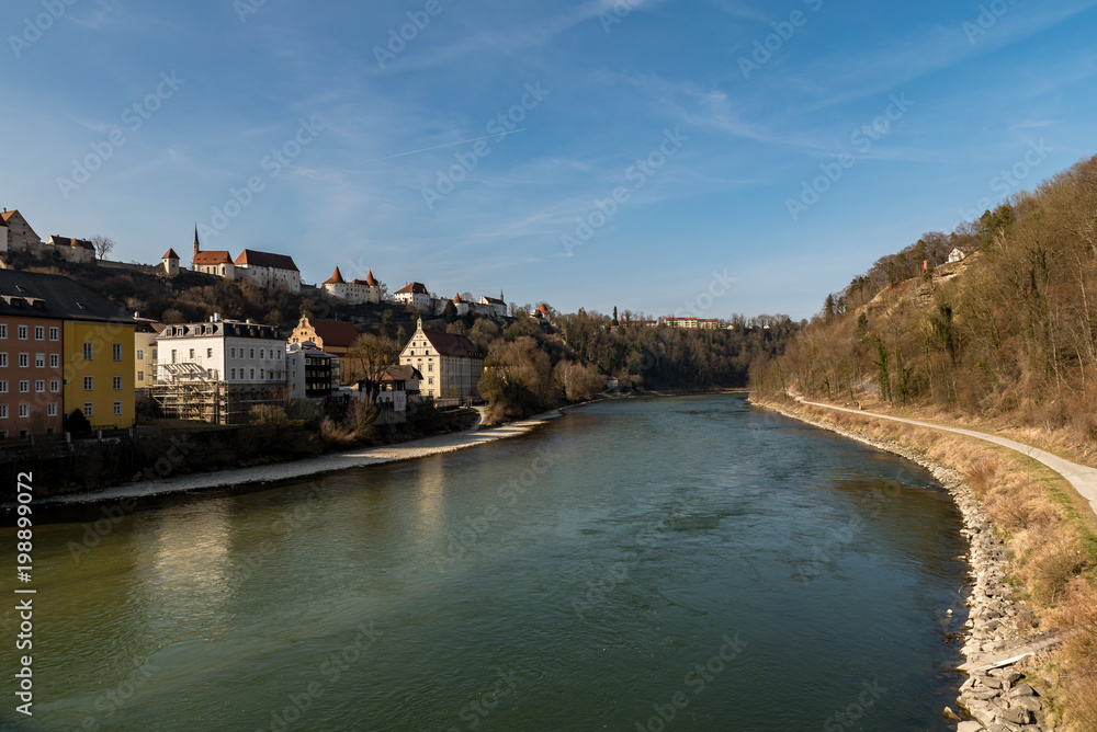 The great river Salzach with a view to the castle of Burghausen