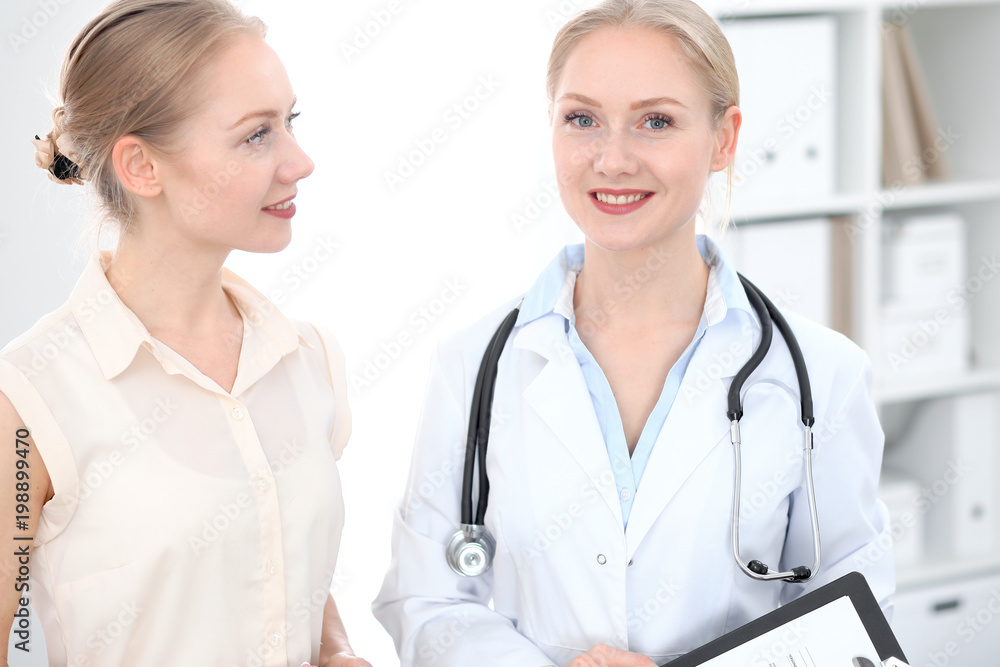 Doctor and patient during personal consulting in hospital Doctor and patient during personal consulting in hospital